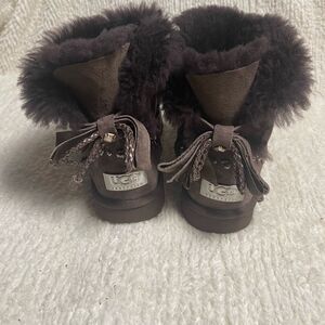 UGG Chocolate Shearling Boots with crystal and studs and bow accents SZ7
